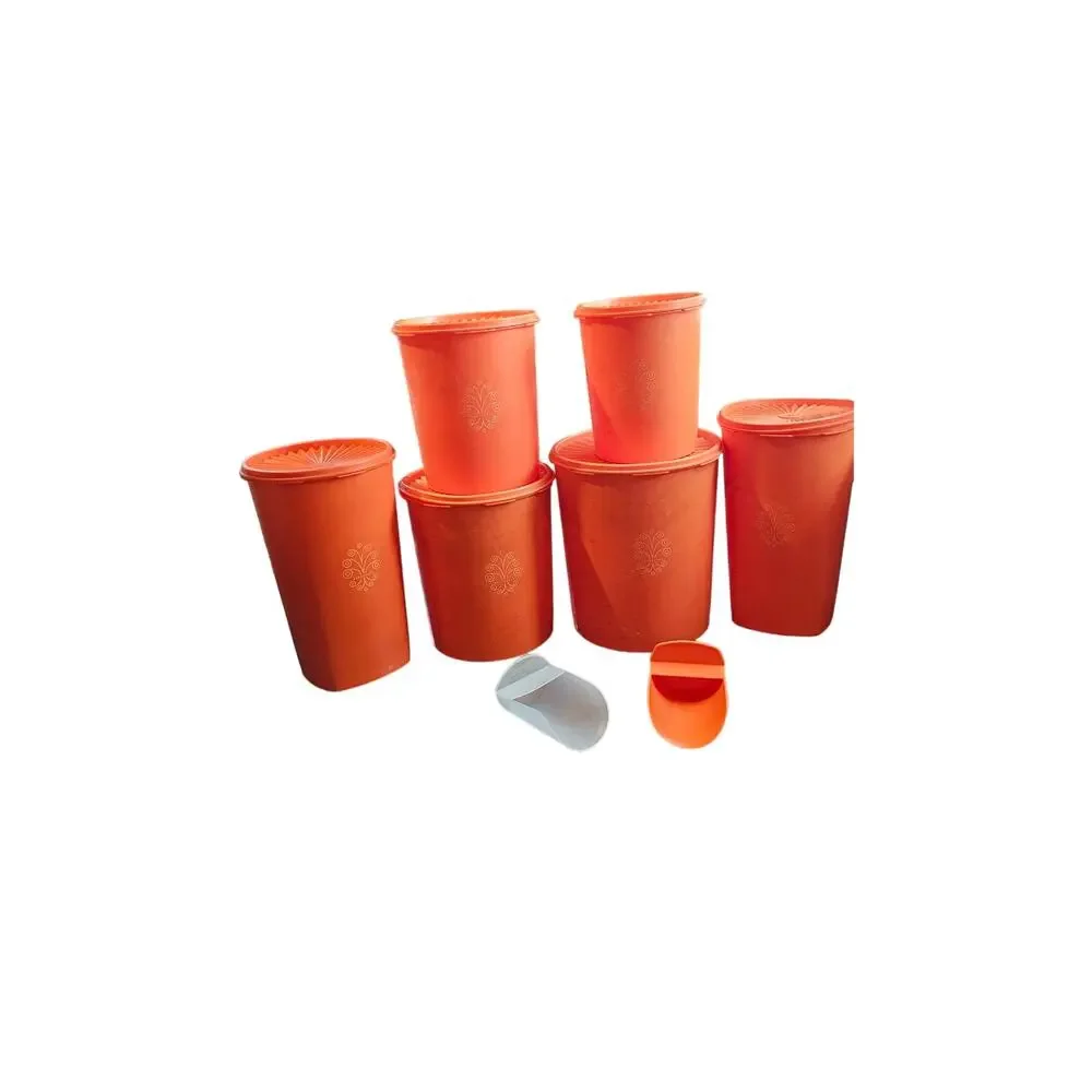 14 piece vintage orange Tupperware canisters- 6 complete‎ and 2 scoops